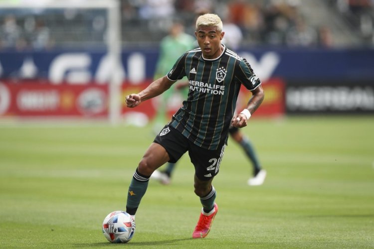 CARSON, CALIFORNIA - APRIL 25: Julian Araujo #2 of Los Angeles Galaxy handles the ball during the game against the New York Red Bulls at Dignity Health Sports Park on April 25, 2021 in Carson, California. (Photo by Meg Oliphant/Getty Images)