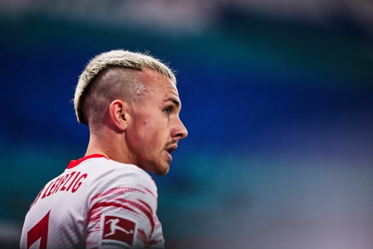 LEIPZIG, GERMANY - DECEMBER 18: Angeliño of RB Leipzig looks on during the Bundesliga match between RB Leipzig and DSC Arminia Bielefeld at Red Bull Arena on December 18, 2021 in Leipzig, Germany. (Photo by Joosep Martinson/Getty Images)