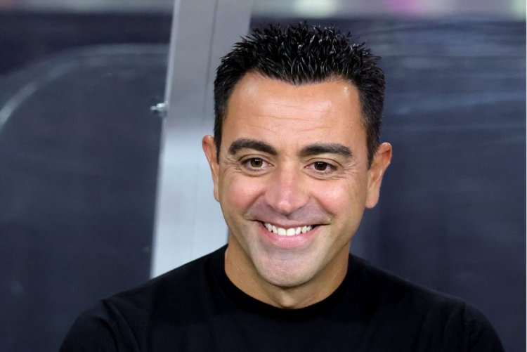 LAS VEGAS, NEVADA - JULY 23: Manager Xavier "Xavi" Hernández Creus of Barcelona smiles on the bench before his team's preseason friendly match against Real Madrid at Allegiant Stadium on July 23, 2022 in Las Vegas, Nevada. Barcelona defeated Real Madrid 1-0. (Photo by Ethan Miller/Getty Images)