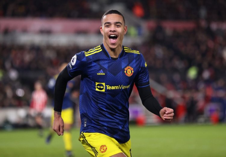 BRENTFORD, ENGLAND - JANUARY 19: Mason Greenwood of Manchester United celebrates after scoring their side's second goal during the Premier League match between Brentford and Manchester United at Brentford Community Stadium on January 19, 2022 in Brentford, England. (Photo by Alex Pantling/Getty Images)
