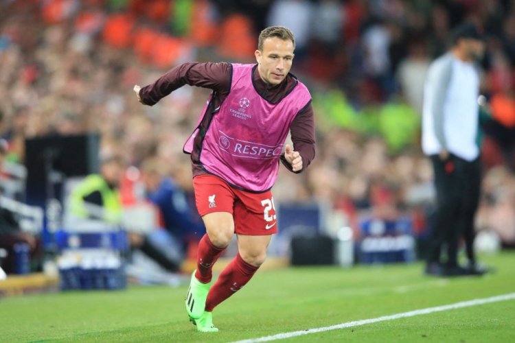 Liverpool's Brazilian midfielder Arthur Melo warms up during the UEFA Champions League group A football match between Liverpool and Ajax at Anfield in Liverpool, north west England on September 13, 2022. (Photo by Lindsey Parnaby / AFP) (Photo by LINDSEY PARNABY/AFP via Getty Images)