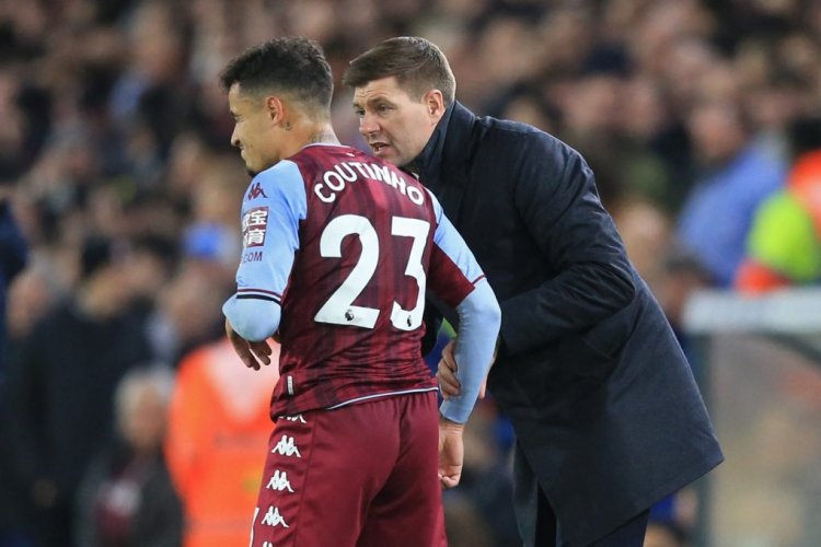 Aston Villa's English head coach Steven Gerrard (R) speaks with Aston Villa's Brazilian midfielder Philippe Coutinho (L) during the English Premier League football match between Leeds United and  Aston Villa at Elland Road in Leeds, northern England on March 10, 2022. - RESTRICTED TO EDITORIAL USE. No use with unauthorized audio, video, data, fixture lists, club/league logos or 'live' services. Online in-match use limited to 120 images. An additional 40 images may be used in extra time. No video emulation. Social media in-match use limited to 120 images. An additional 40 images may be used in extra time. No use in betting publications, games or single club/league/player publications. (Photo by Lindsey Parnaby / AFP) / RESTRICTED TO EDITORIAL USE. No use with unauthorized audio, video, data, fixture lists, club/league logos or 'live' services. Online in-match use limited to 120 images. An additional 40 images may be used in extra time. No video emulation. Social media in-match use limited to 120 images. An additional 40 images may be used in extra time. No use in betting publications, games or single club/league/player publications. / RESTRICTED TO EDITORIAL USE. No use with unauthorized audio, video, data, fixture lists, club/league logos or 'live' services. Online in-match use limited to 120 images. An additional 40 images may be used in extra time. No video emulation. Social media in-match use limited to 120 images. An additional 40 images may be used in extra time. No use in betting publications, games or single club/league/player publications. (Photo by LINDSEY PARNABY/AFP via Getty Images)