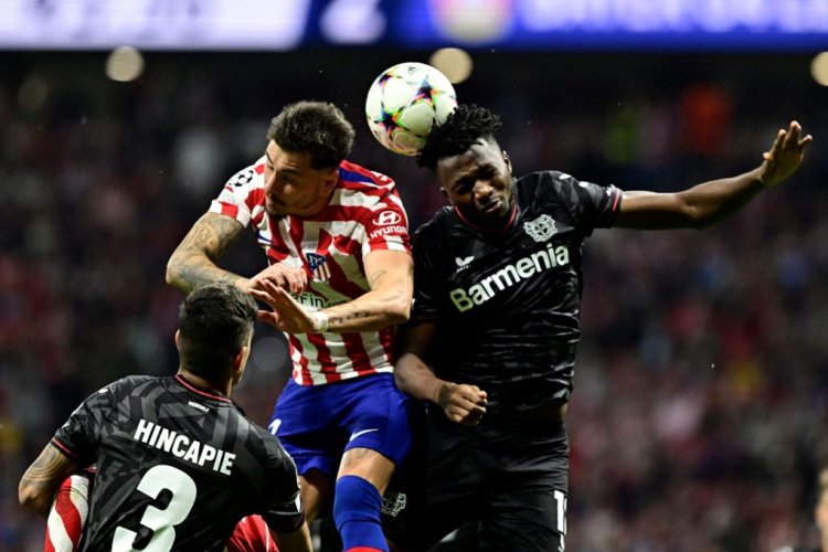 Atletico Madrid's Uruguayan defender Jose Gimenez (L) vies with Leverkusen's Burkinabe defender Edmond Tapsoba during the UEFA Champions League 1st round day 5, Group B football match between Club Atletico de Madrid and Bayer Leverkusen at the Wanda Metropolitano stadium in Madrid on October 26, 2022. (Photo by JAVIER SORIANO / AFP) (Photo by JAVIER SORIANO/AFP via Getty Images)