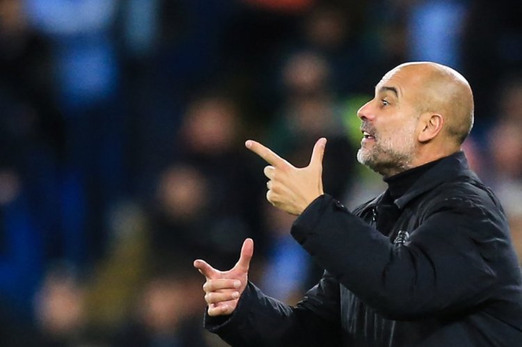 Manchester City's Spanish manager Pep Guardiola reacts during the UEFA Champions League group G football match between Manchester City and FC Copenhagen at the Etihad Stadium in Manchester, north west England on October 5, 2022. (Photo by Lindsey Parnaby / AFP) (Photo by LINDSEY PARNABY/AFP via Getty Images)