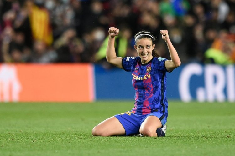 Barcelona's Spanish midfielder Aitana Bonmati celebrates after scoring a goal during the women's UEFA Champions League quarter final second leg football match between FC Barcelona and Real Madrid CF at the Camp Nou stadium in Barcelona on March 30, 2022. (Photo by Josep LAGO / AFP) (Photo by JOSEP LAGO/AFP via Getty Images)
