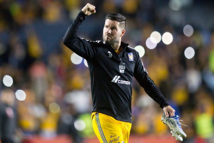 Tigres' Andree Pierre-Gignac (L) celebrates after scoring against Necaxa during their Mexican Apertura 2022  tournament football at the Universitario stadium in Monterrey, Mexico, on October 8,  2022. (Photo by Julio Cesar AGUILAR / AFP) (Photo by JULIO CESAR AGUILAR/AFP via Getty Images)