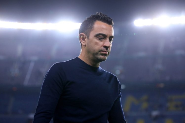 BARCELONA, SPAIN - OCTOBER 26: Xavi, Head Coach of FC Barcelona looks dejected following their side's defeat and elimination from the UEFA Champions League in the UEFA Champions League group C match between FC Barcelona and FC Bayern München at Spotify Camp Nou on October 26, 2022 in Barcelona, Spain. (Photo by Eric Alonso/Getty Images)