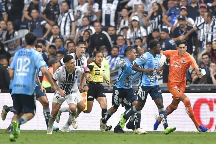 MONTERREY, MEXICO - OCTOBER 23: Esteban Andrada of Monterrey argues with Aviles Hurtado of Pachuca after scoring his team's first goal during the semifinal second leg match between Monterrey and Pachuca as part of the Torneo Apertura 2022 Liga MX at BBVA Stadium on October 23, 2022 in Monterrey, Mexico. (Photo by Azael Rodriguez/Getty Images)