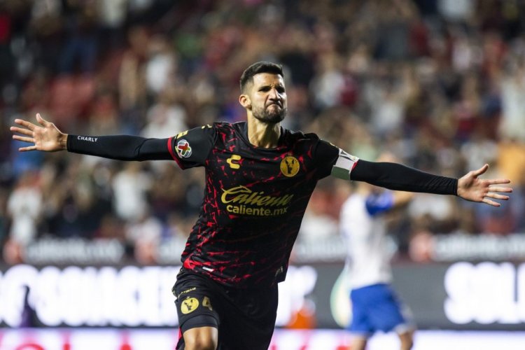 TIJUANA, MEXICO - AUGUST 12: Lisandro Lopez of Tijuana celebrates after scoring his team's third goal during the 8th round match between Tijuana and Puebla as part of the Torneo Apertura 2022 Liga MX at Caliente Stadium on August 12, 2022 in Tijuana, Mexico. (Photo by Francisco Vega/Getty Images)