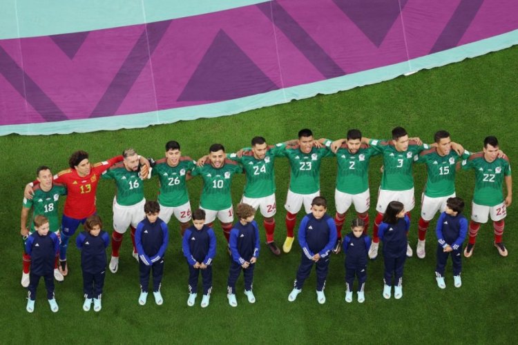 LUSAIL CITY, QATAR - NOVEMBER 26: Mexico players line up for the national anthem prior to the FIFA World Cup Qatar 2022 Group C match between Argentina and Mexico at Lusail Stadium on November 26, 2022 in Lusail City, Qatar. (Photo by Richard Heathcote/Getty Images)