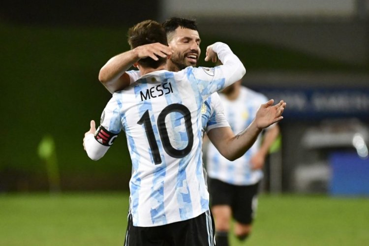 CUIABA, BRAZIL - JUNE 28: Lionel Messi of Argentina celebrates with teammate Sergio Agüero after scoring the third goal of his team during a Group A match between Argentina and Bolivia as part of Copa America 2021 at Arena Pantanal on June 28, 2021 in Cuiaba, Brazil. (Photo by Rogerio Florentino/Getty Images)