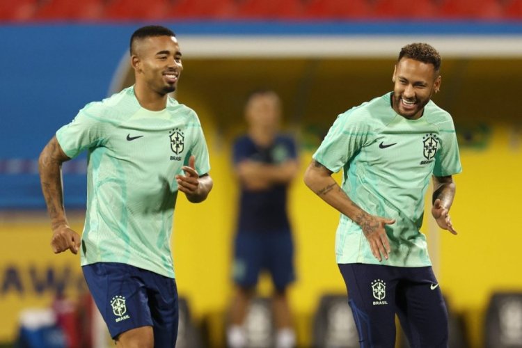 DOHA, QATAR - NOVEMBER 23: Gabriel Jesus (L) and Neymar of Brazil react during Brazil match day -1  training session at Al Arabi SC Stadium on November 23, 2022 in Doha, Qatar. (Photo by Christopher Lee/Getty Images)