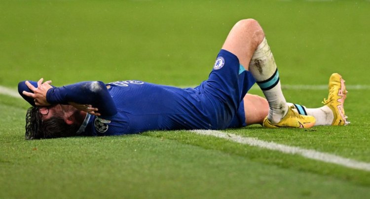 Chelsea's English defender Ben Chilwell reacts on the floor before being taken off injured during the UEFA Champions League Group E football match between Chelsea and Dinamo Zagreb at Stamford Bridge in London on November 2, 2022. (Photo by Glyn KIRK / AFP) (Photo by GLYN KIRK/AFP via Getty Images)