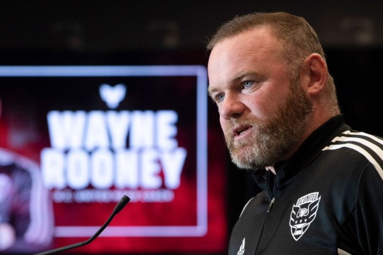 British soccer star Wayne Rooney speaks during a press conference where he was announced as the new Head Coach of Major League Soccer's DC United at Audi Field in Washington, DC, on July 12, 2022. - Former England and Manchester United star Wayne Rooney was named on Tuesday as the new head coach of DC United and tasked with reviving the moribund Major League Soccer team. (Photo by ROBERTO SCHMIDT / AFP) (Photo by ROBERTO SCHMIDT/AFP via Getty Images)