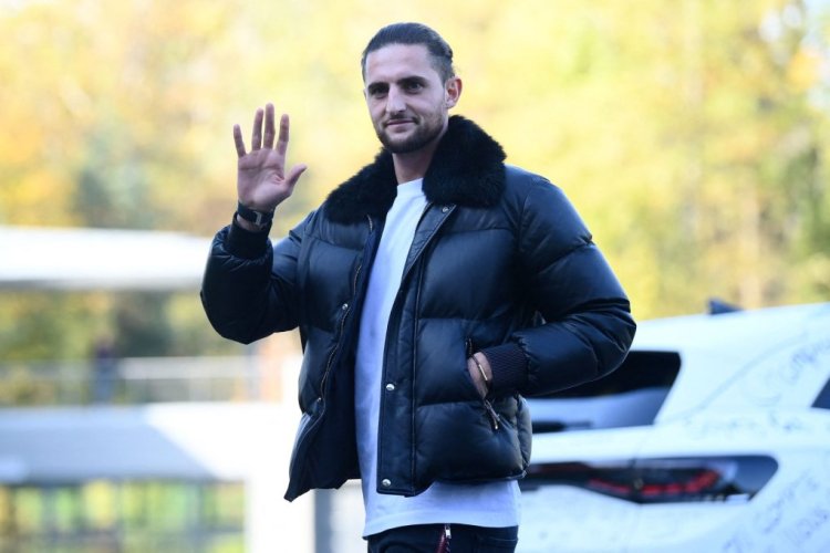 France's midfielder Adrien Rabiot waves as he arrives for a get-together, two days before the French national team leave for the upcoming Qatar 2022 World Cup football tournament, at the team's training ground in Clairefontaine-en-Yvelines, outside Paris on November 14, 2022. - The week-long countdown to the World Cup in Qatar begins as the world's leading footballers focused their attention on one of the most controversial tournaments in history. The first World Cup to be held in the Arab world will kick off on November 20, 2022, when the host nation face Ecuador. (Photo by FRANCK FIFE / AFP) (Photo by FRANCK FIFE/AFP via Getty Images)