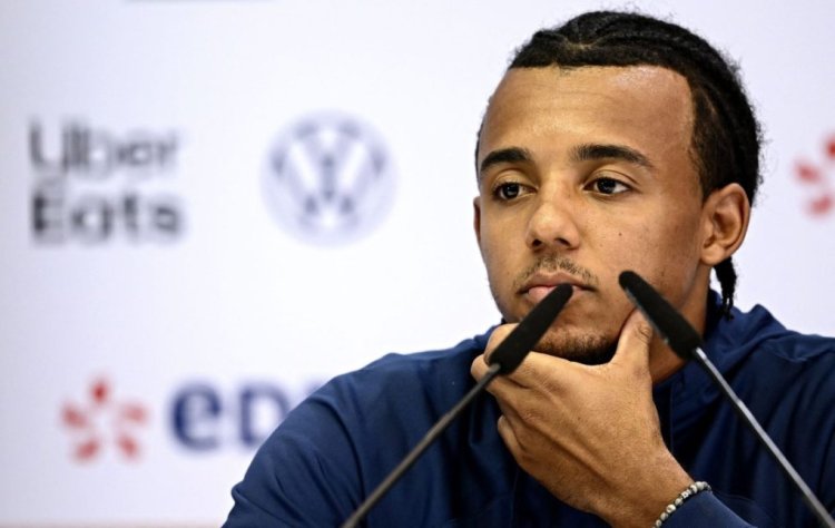 France's defender Jules Kounde gives a press conference at the Jassim-bin-Hamad Stadium in Doha on November 28, 2022, during the Qatar 2022 World Cup football tournament. (Photo by FRANCK FIFE / AFP) (Photo by FRANCK FIFE/AFP via Getty Images)