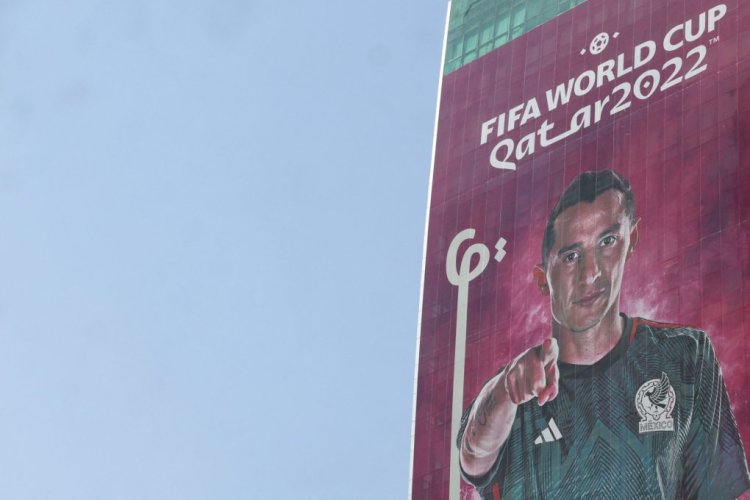 A picture taken on October 11, 2022, shows a banner, bearing the picture of Mexico's midfielder Andres Guardado, in the Qatari capital Doha. (Photo by Giuseppe CACACE / AFP) (Photo by GIUSEPPE CACACE/AFP via Getty Images)