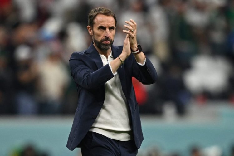 England's coach #00 Gareth Southgate applauds supporters at the end of the Qatar 2022 World Cup Group B football match between England and USA at the Al-Bayt Stadium in Al Khor, north of Doha on November 25, 2022. (Photo by Paul ELLIS / AFP) (Photo by PAUL ELLIS/AFP via Getty Images)
