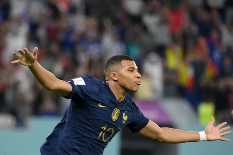 France's forward #10 Kylian Mbappe celebrates after scoring his team's second goal during the Qatar 2022 World Cup Group D football match between France and Denmark at Stadium 974 in Doha on November 26, 2022. (Photo by FRANCK FIFE / AFP) (Photo by FRANCK FIFE/AFP via Getty Images)