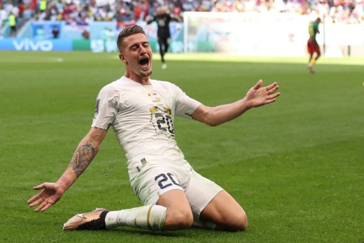 Serbia's midfielder #20 Sergej Milinkovic-Savic celebrates scoring his team's second goal during the Qatar 2022 World Cup Group G football match between Cameroon and Serbia at the Al-Janoub Stadium in Al-Wakrah, south of Doha on November 28, 2022. (Photo by ADRIAN DENNIS / AFP) (Photo by ADRIAN DENNIS/AFP via Getty Images)