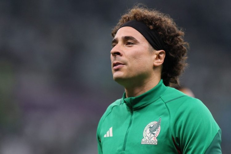 Mexico's goalkeeper #13 Guillermo Ochoa warms up ahead of the Qatar 2022 World Cup Group C football match between Saudi Arabia and Mexico at the Lusail Stadium in Lusail, north of Doha on November 30, 2022. (Photo by KARIM JAAFAR / AFP) (Photo by KARIM JAAFAR/AFP via Getty Images)