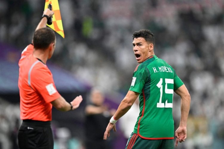 Mexico's defender #15 Hector Moreno (R) reacts towards a touchline official during the Qatar 2022 World Cup Group C football match between Saudi Arabia and Mexico at the Lusail Stadium in Lusail, north of Doha on November 30, 2022. (Photo by Alfredo ESTRELLA / AFP) (Photo by ALFREDO ESTRELLA/AFP via Getty Images)