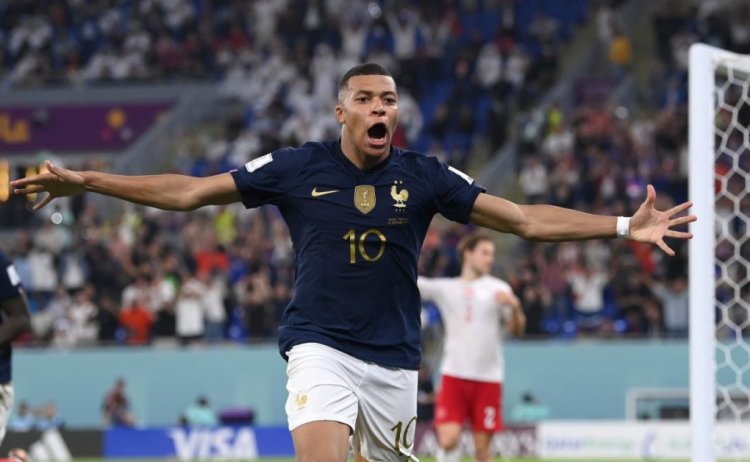 DOHA, QATAR - NOVEMBER 26: France striker Kylian Mbappe celebrates after scoring the second goal during the FIFA World Cup Qatar 2022 Group D match between France and Denmark at Stadium 974 on November 26, 2022 in Doha, Qatar. (Photo by Stu Forster/Getty Images)