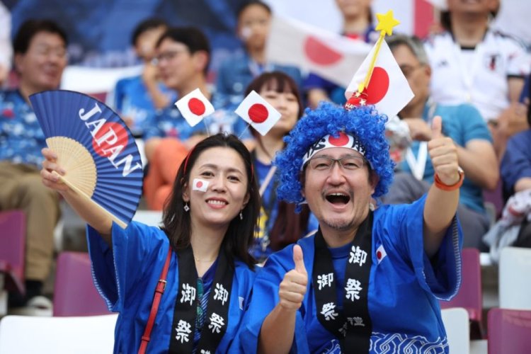 DOHA, QATAR - NOVEMBER 23: Japan fans enjoy the pre match atmosphere prior to the FIFA World Cup Qatar 2022 Group E match between Germany and Japan at Khalifa International Stadium on November 23, 2022 in Doha, Qatar. (Photo by Alex Grimm/Getty Images)