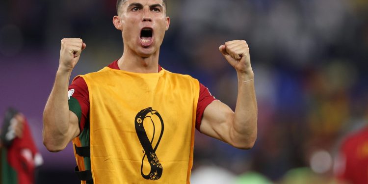 DOHA, QATAR - NOVEMBER 24: Cristiano Ronaldo of Portugal celebrates in front of the spectators after the final whistle during the FIFA World Cup Qatar 2022 Group H match between Portugal and Ghana at Stadium 974 on November 24, 2022 in Doha, Qatar. (Photo by Richard Heathcote/Getty Images)