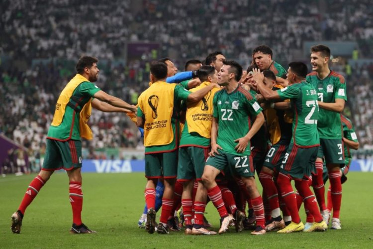 LUSAIL CITY, QATAR - NOVEMBER 30: Luis Chavez of Mexico celebrates with teammates after scoring their team's second goal during the FIFA World Cup Qatar 2022 Group C match between Saudi Arabia and Mexico at Lusail Stadium on November 30, 2022 in Lusail City, Qatar. (Photo by Michael Steele/Getty Images)