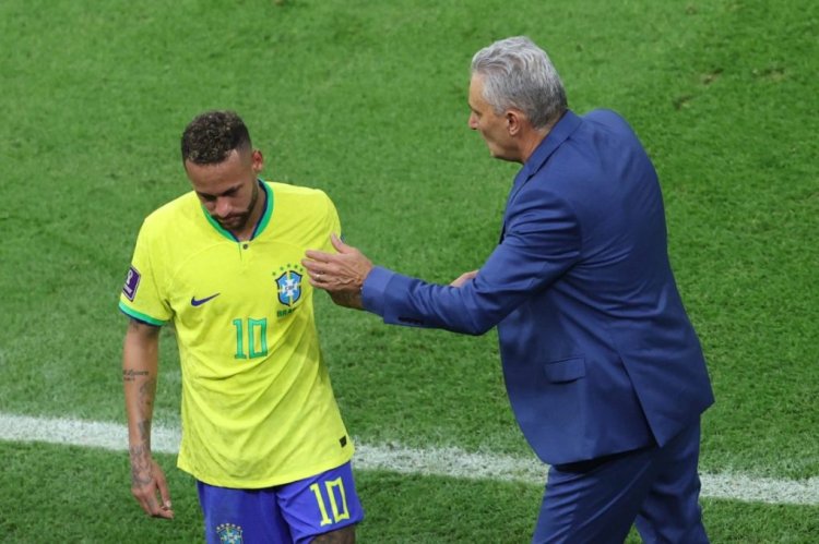 TOPSHOT - Brazil's coach #00 Tite greets Brazil's forward #10 Neymar as he is replaced during the Qatar 2022 World Cup Group G football match between Brazil and Serbia at the Lusail Stadium in Lusail, north of Doha on November 24, 2022. (Photo by Giuseppe CACACE / AFP) (Photo by GIUSEPPE CACACE/AFP via Getty Images)