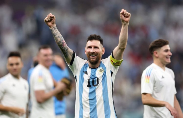 LUSAIL CITY, QATAR - DECEMBER 13: Lionel Messi of Argentina celebrates the team's 3-0 victory in the FIFA World Cup Qatar 2022 semi final match between Argentina and Croatia at Lusail Stadium on December 13, 2022 in Lusail City, Qatar. (Photo by Clive Brunskill/Getty Images)