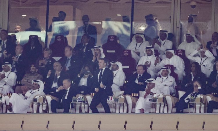 LUSAIL CITY, QATAR - DECEMBER 18: French President Emmanuel Macron celebrates during the FIFA World Cup Qatar 2022 Final match between Argentina and France at Lusail Stadium on December 18, 2022 in Lusail City, Qatar. (Photo by Lars Baron/Getty Images)