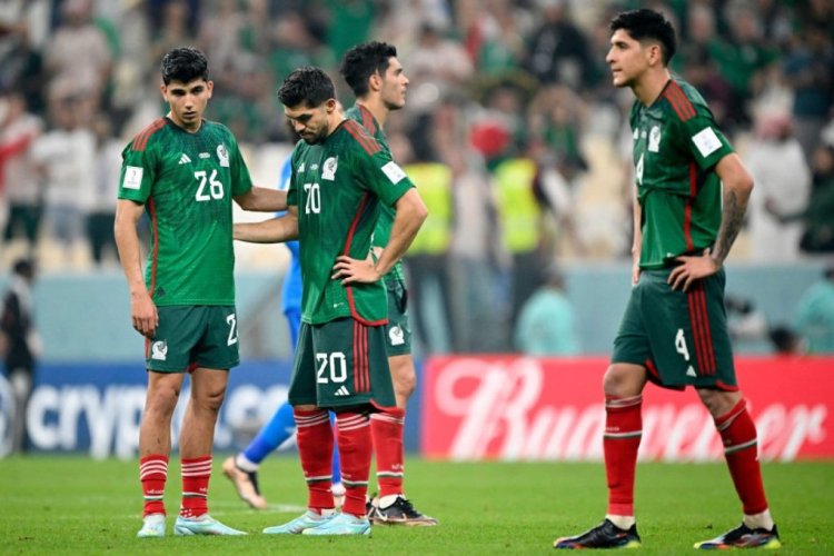 Mexico's defender #26 Kevin Alvarez (L) and Mexico's forward #20 Henry Martin (2nd L) reacts after the Qatar 2022 World Cup Group C football match between Saudi Arabia and Mexico at the Lusail Stadium in Lusail, north of Doha on November 30, 2022. (Photo by Alfredo ESTRELLA / AFP) (Photo by ALFREDO ESTRELLA/AFP via Getty Images)
