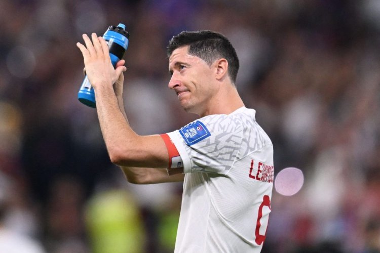 Poland's forward #09 Robert Lewandowski greets supporters at the end of the Qatar 2022 World Cup round of 16 football match between France and Poland at the Al-Thumama Stadium in Doha on December 4, 2022. (Photo by Kirill KUDRYAVTSEV / AFP) (Photo by KIRILL KUDRYAVTSEV/AFP via Getty Images)