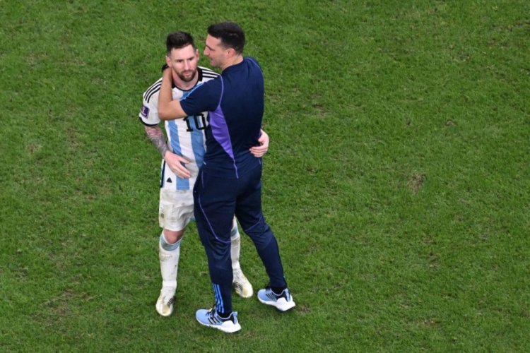 Argentina's forward #10 Lionel Messi (L) celebrates with Argentina's coach #00 Lionel Scaloni after they won the Qatar 2022 World Cup quarter-final football match between The Netherlands and Argentina at Lusail Stadium, north of Doha on December 9, 2022. (Photo by Kirill KUDRYAVTSEV / AFP) (Photo by KIRILL KUDRYAVTSEV/AFP via Getty Images)