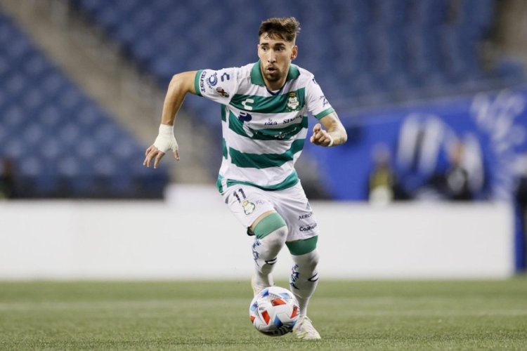 SEATTLE, WASHINGTON - SEPTEMBER 14: Fernando Gorriaran #11 of Santos Laguna in action against the Seattle Sounders during the second half at Lumen Field on September 14, 2021 in Seattle, Washington. (Photo by Steph Chambers/Getty Images)