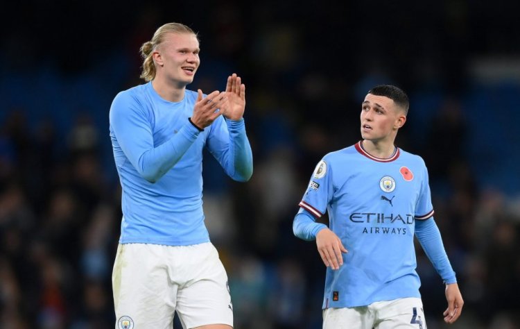 MANCHESTER, ENGLAND - NOVEMBER 05: Erling Haaland and Phil Foden of Manchester City acknowledge the fans after their sides victory during the Premier League match between Manchester City and Fulham FC at Etihad Stadium on November 05, 2022 in Manchester, England. (Photo by Shaun Botterill/Getty Images)