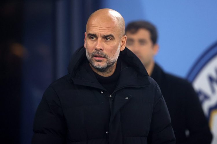 MANCHESTER, ENGLAND - DECEMBER 22: Manchester City Manager Pep Guardiola looks on ahead of the Carabao Cup Fourth Round match between Manchester City and Liverpool at Etihad Stadium on December 22, 2022 in Manchester, England. (Photo by Naomi Baker/Getty Images)