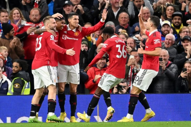 MANCHESTER, ENGLAND - OCTOBER 30: Marcus Rashford of Manchester United  celebrates with Cristiano Ronaldo, Luke Shaw, Anthony Elanga and Diogo Dalot after scoring their team's first goal  during the Premier League match between Manchester United and West Ham United at Old Trafford on October 30, 2022 in Manchester, England. (Photo by Michael Regan/Getty Images)