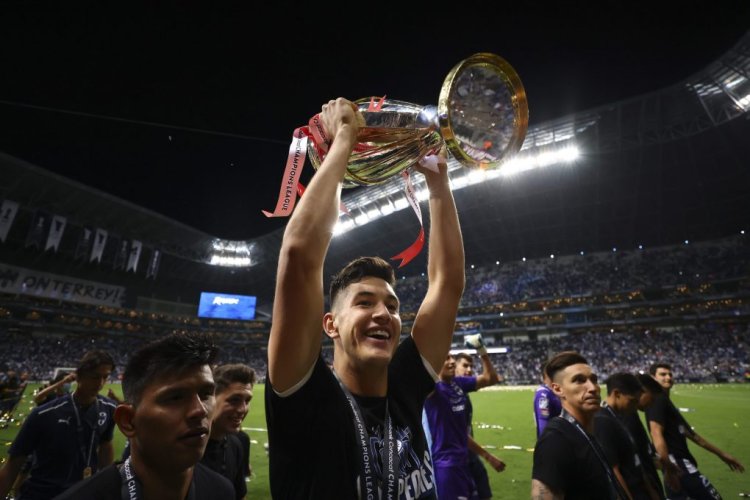 MONTERREY, MEXICO - OCTOBER 28: Cesar Montes #3 of Monterrey celebrate with the trophy after winning the final match of CONCACAF Champions League 2021 between Monterrey and Club America at BBVA Stadium on October 28, 2021 in Monterrey, Mexico. (Photo by Hector Vivas/Getty Images)