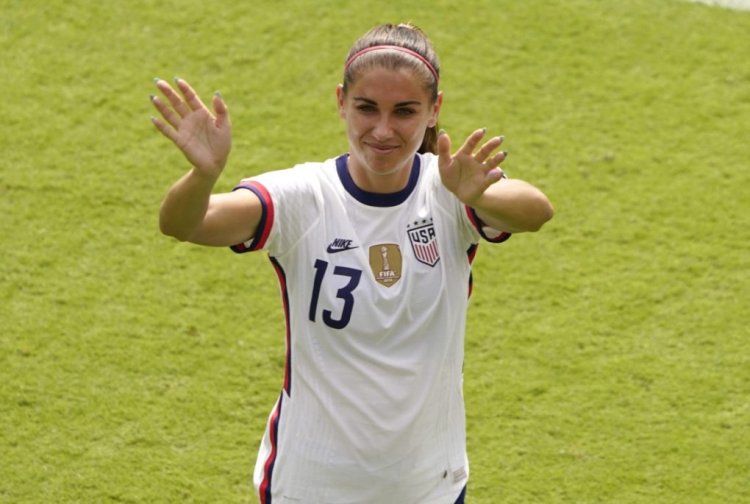 KANSAS CITY, KS - SEPTEMBER 03: Alex Morgan #13 of United States waves to the crowd after their international friendly match against Nigeria at Children's Mercy Park match on September 3, 2022 in Kansas City, Kansas. (Photo by Ed Zurga/Getty Images)