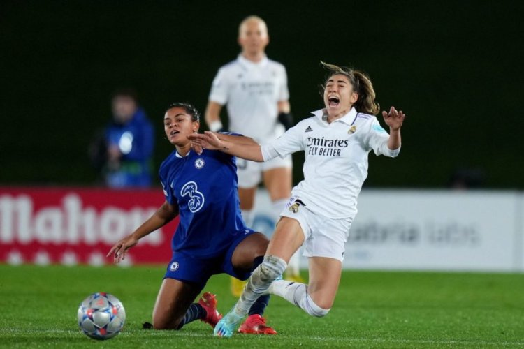 MADRID, SPAIN - DECEMBER 08: Olga Carmona of Real Madrid is tackled by Jess Carter of Chelsea during the UEFA Women's Champions League group A match between Real Madrid and Chelsea FC at Estadio Alfredo Di Stefano on December 08, 2022 in Madrid, Spain. (Photo by Angel Martinez/Getty Images)