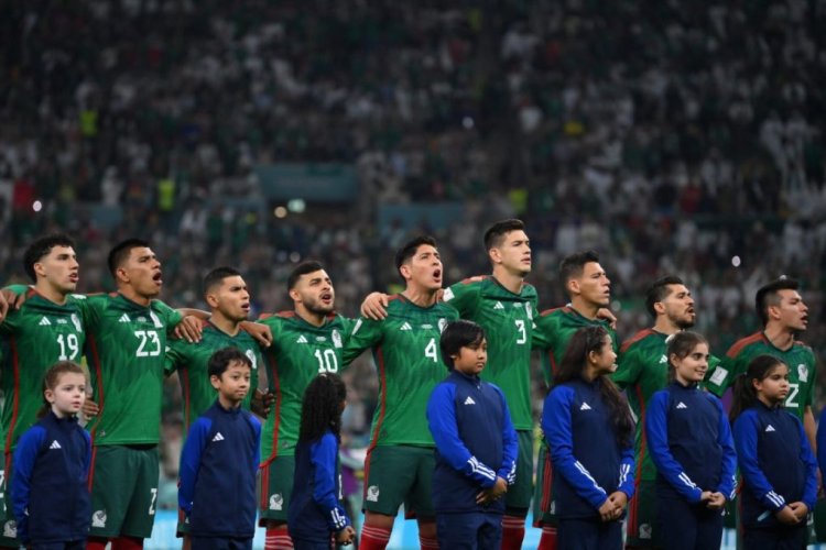 LUSAIL CITY, QATAR - NOVEMBER 30: Mexico players line up for the national anthem prior to the FIFA World Cup Qatar 2022 Group C match between Saudi Arabia and Mexico at Lusail Stadium on November 30, 2022 in Lusail City, Qatar. (Photo by Justin Setterfield/Getty Images)