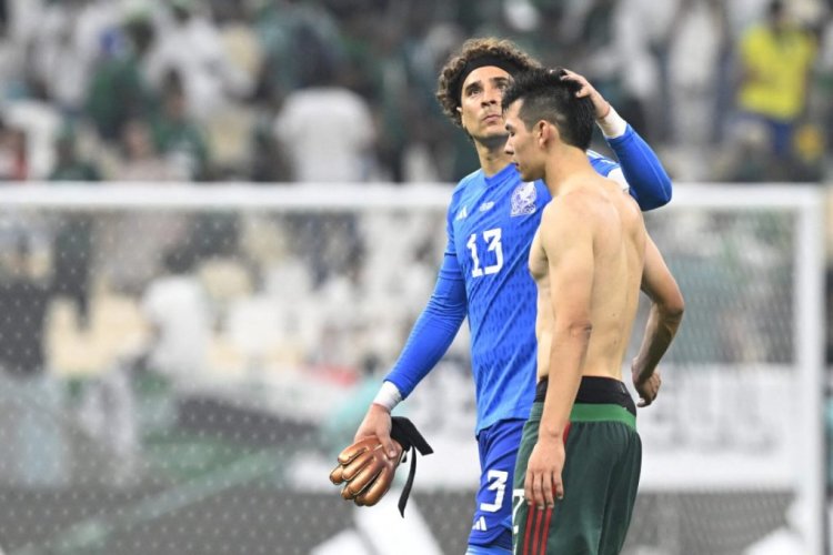 TOPSHOT - Mexico's goalkeeper #13 Guillermo Ochoa (2nd R) reacts at the end of the Qatar 2022 World Cup Group C football match between Saudi Arabia and Mexico at the Lusail Stadium in Lusail, north of Doha on November 30, 2022. (Photo by Alfredo ESTRELLA / AFP) (Photo by ALFREDO ESTRELLA/AFP via Getty Images)