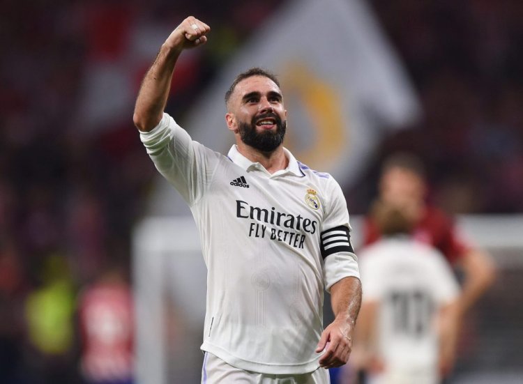 MADRID, SPAIN - SEPTEMBER 18: Dani Carvajal of Real Madrid celebrates following their side's victory in the LaLiga Santander match between Atletico de Madrid and Real Madrid CF at Civitas Metropolitano Stadium on September 18, 2022 in Madrid, Spain. (Photo by Denis Doyle/Getty Images)