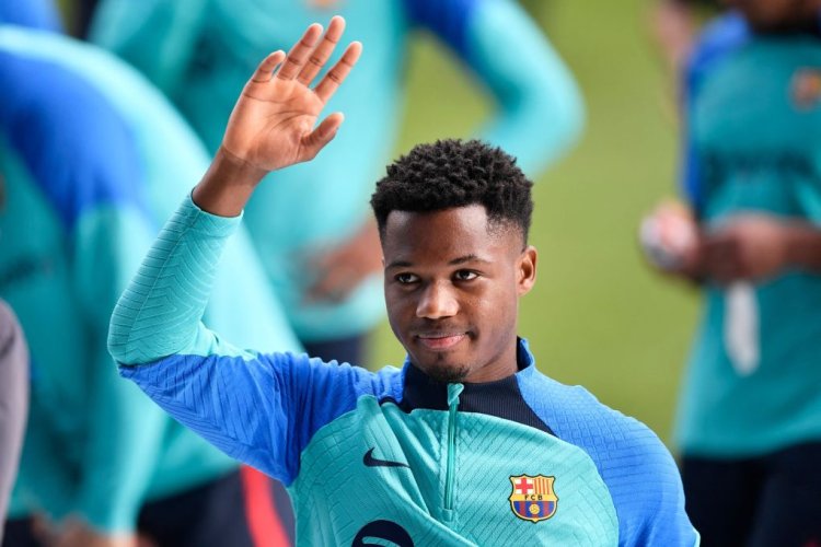 Barcelona's Spanish midfielder Ansu Fati waves the crowd during a training session open to fans, at the Camp Nou stadium in Barcelona on January 2, 2023. (Photo by Pau BARRENA / AFP) (Photo by PAU BARRENA/AFP via Getty Images)