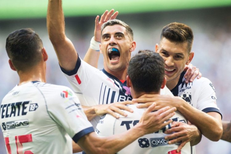 Monterrey's German Berterame (C) celebrates with teammates after scoring against Cruz Azul during the Mexican Apertura 2022 tournament football match at the BBVA Bancomer stadium in Monterrey, Mexico, on October 15, 2022. (Photo by Julio Cesar AGUILAR / AFP) (Photo by JULIO CESAR AGUILAR/AFP via Getty Images)