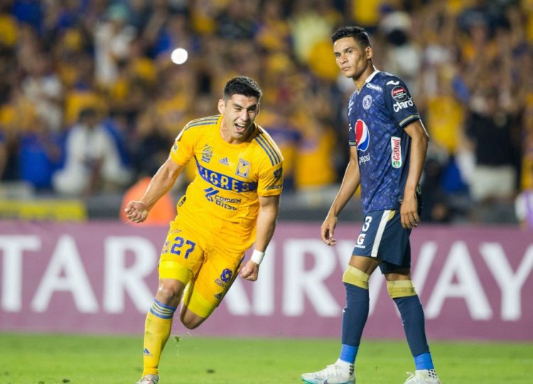Mexico's Tigres Jesus Angulo (L) celebrates after scoring against Honduras' Motagua during the CONCACAF Champions League football match at the Universitario stadium in Monterrey, Mexico, on April 13, 2023. (Photo by Julio Cesar AGUILAR / AFP) (Photo by JULIO CESAR AGUILAR/AFP via Getty Images)