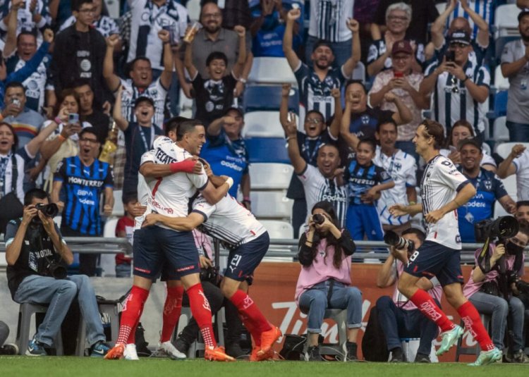Monterrey's  Rogelio Funes Mori (L) celebrates after scoring against Pumas during the Mexican Clausura 2023 tournament football match at the BBVA Bancomer stadium in Monterrey, Mexico, on April  29, 2023. (Photo by Julio Cesar AGUILAR / AFP) (Photo by JULIO CESAR AGUILAR/AFP via Getty Images)